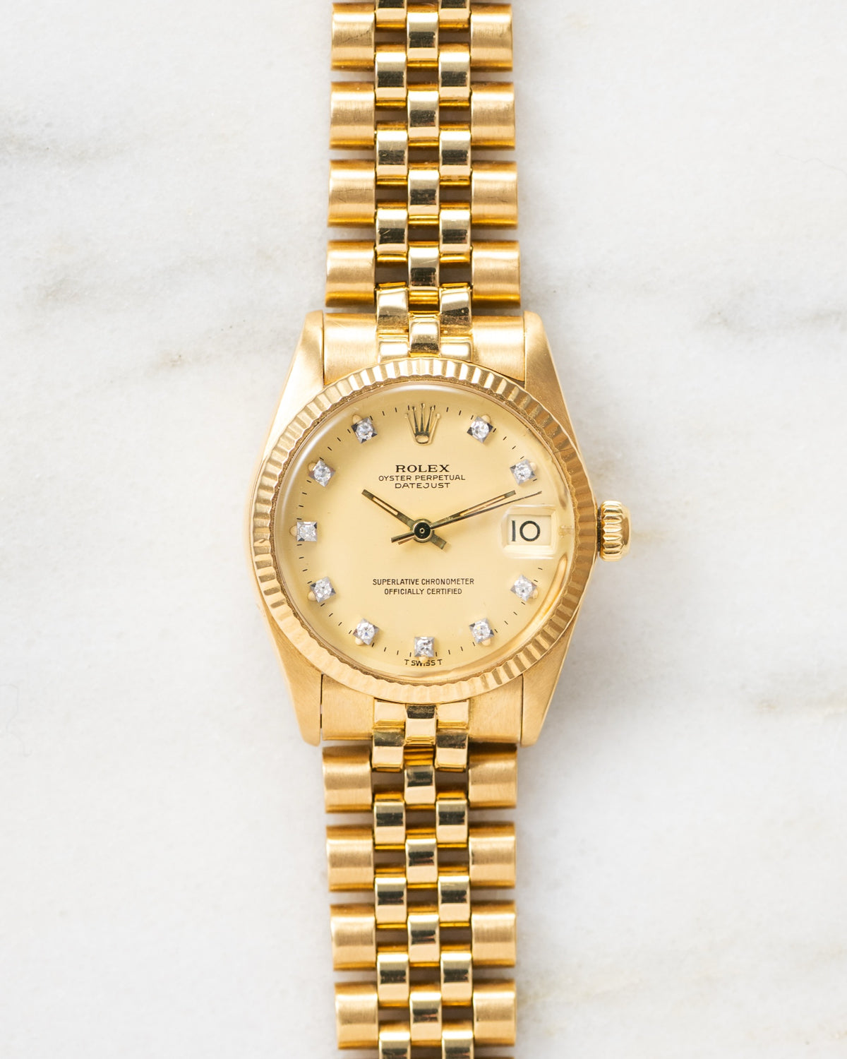 Vintage Rolex Datejust 31 6827 in 18k yellow gold with champagne diamond dial and Jubilee bracelet